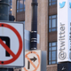 Elon Has Restored Nearly 12,000 Banned Twitter Accounts, Data Shows 2 Twitter'S Main Headquarters Sign In Front Of Several Street Signs With Arrows Pointing Both Left And Right.